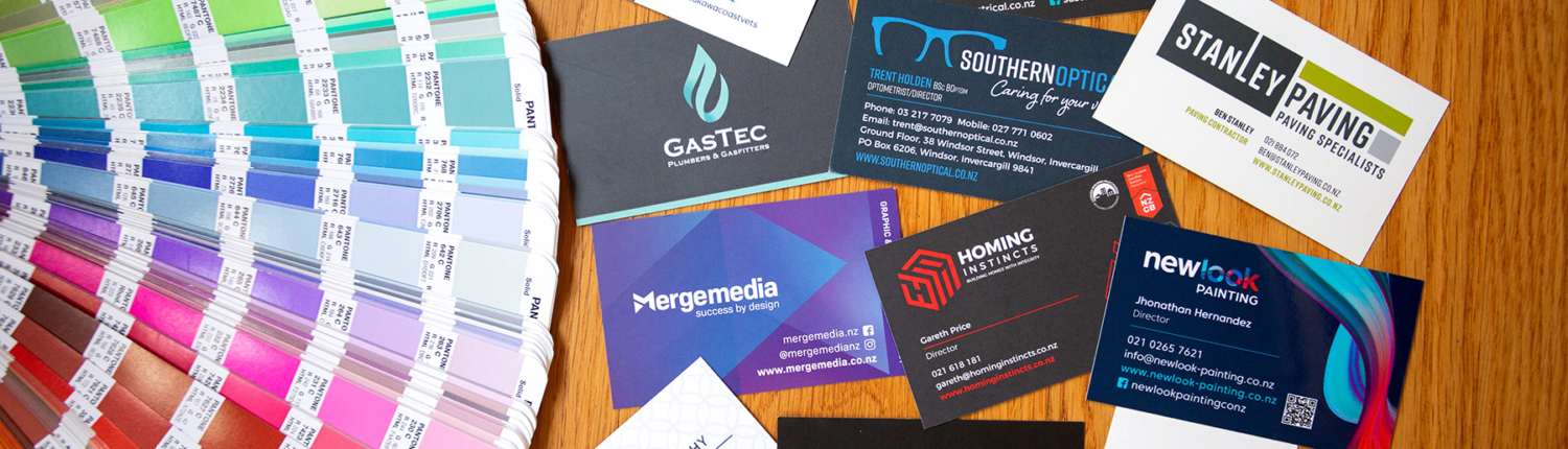 Print Design East Auckland Merge Media logos and printed business cards of lots of different companies